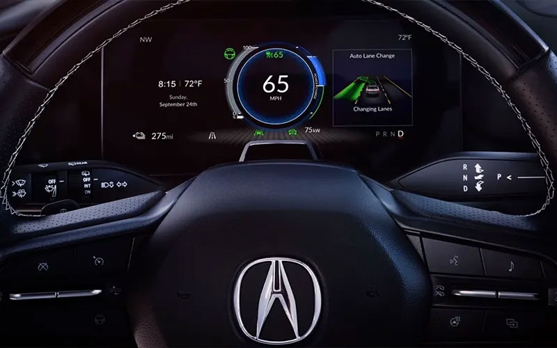 Close-up of an 2025 Acura ZDX dashboard with speedometer showing 65 MPH, and lane assist display.