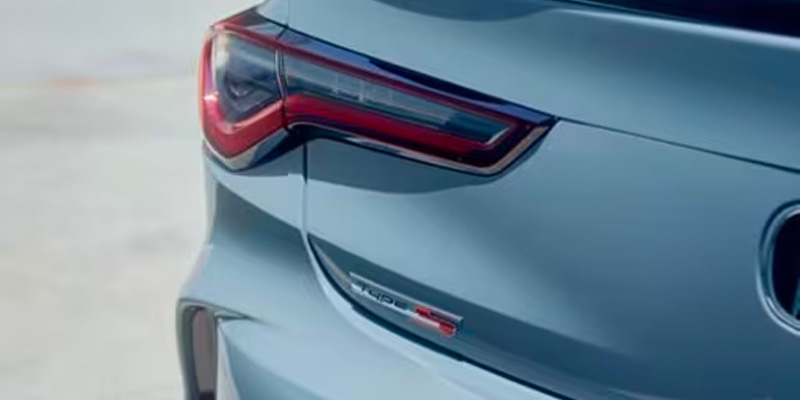 Close-up of a sleek 2025 Acura TLX's rear tail light and badge showing "Type S" model.