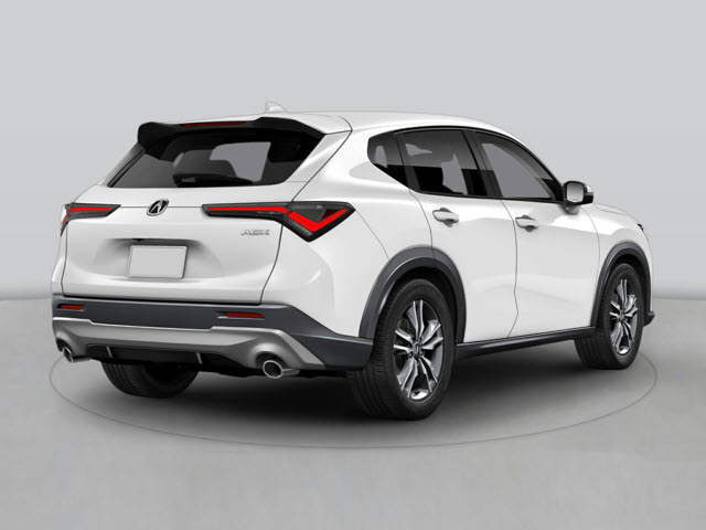 A white 2026 Acura ADX SUV shown from the rear, featuring sleek tail lights and alloy wheels.