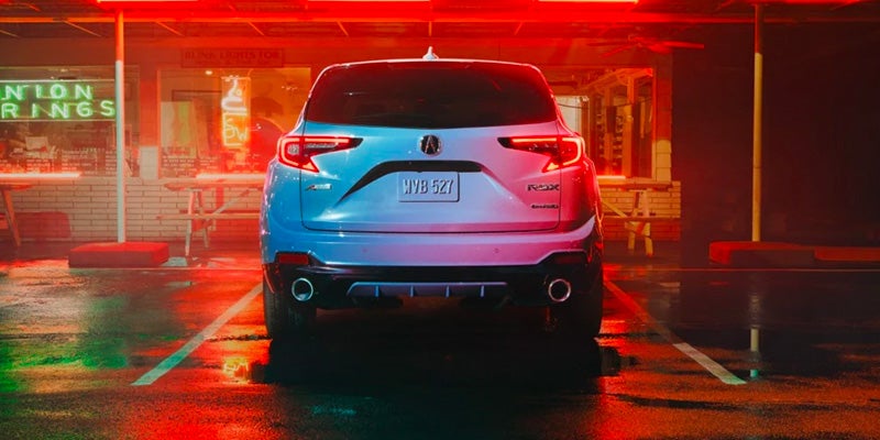 rear view of a 2025 Acura RDX parked in a garage